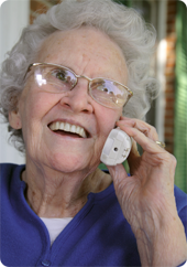 Senior woman talking on phone and smiling